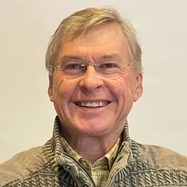 Mark E Benson